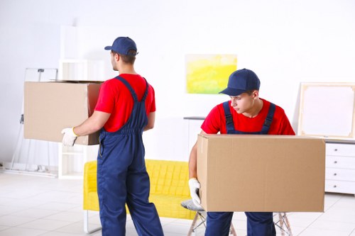 Commercial relocation planning in Acton with office equipment and moving boxes