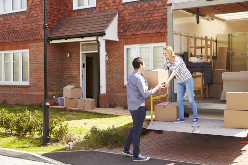 Removal team providing a transparent quote for an Acton home move