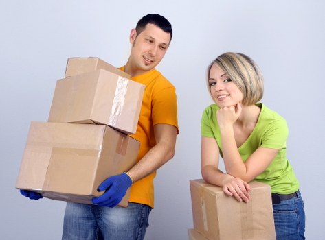 Packed moving boxes ready for Acton home removals