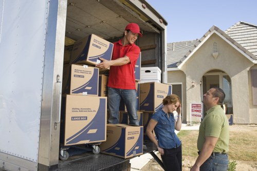 Residential moving service in Acton with furniture and packing materials