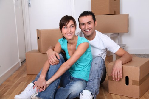 Local movers handling furniture removals in Acton near residential property