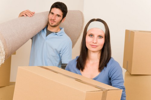 Household furniture being moved from a flat in Acton