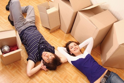 Careful loading of household items for an Acton relocation