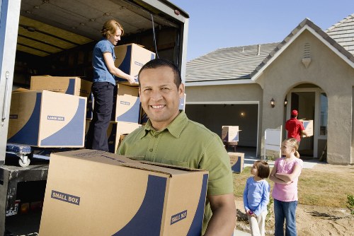 Final delivery and unloading by a removals crew