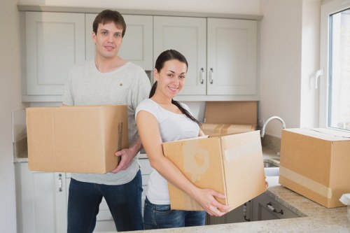 Packed office equipment ready for relocation in Acton